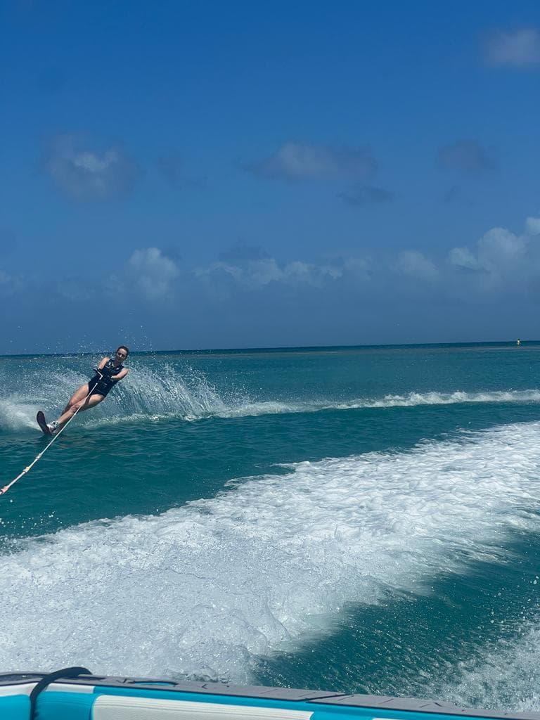Annie waterskiing across the sea